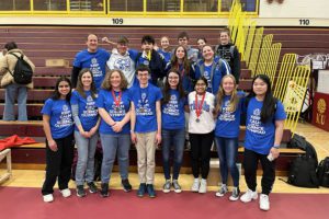 science olympiad team poses together