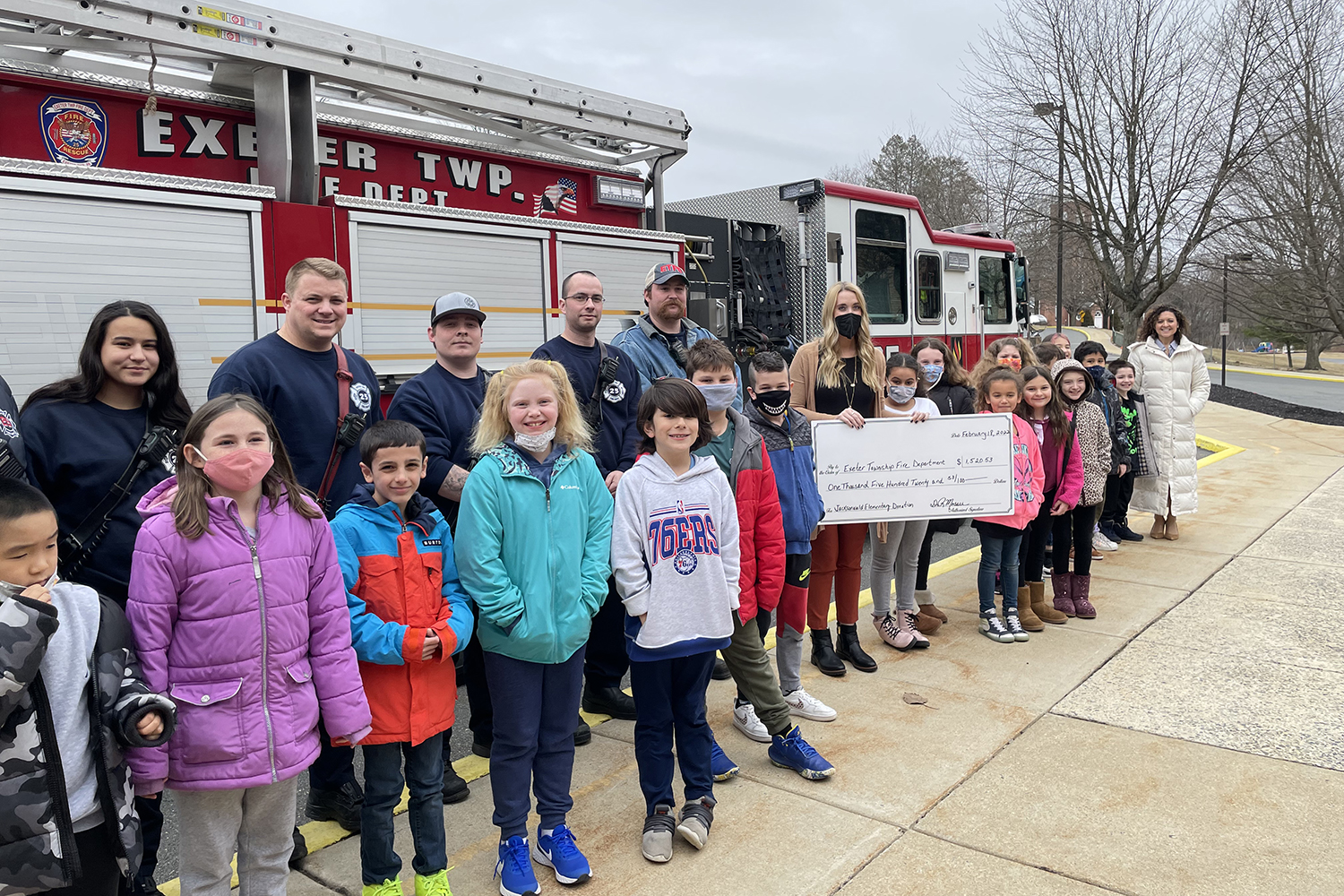 photo of jacksonwald students with exeter firefighters