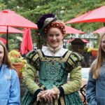 exeter student pose with renaissance faire lady