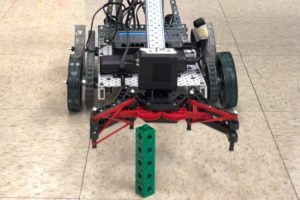 robot picks up piece